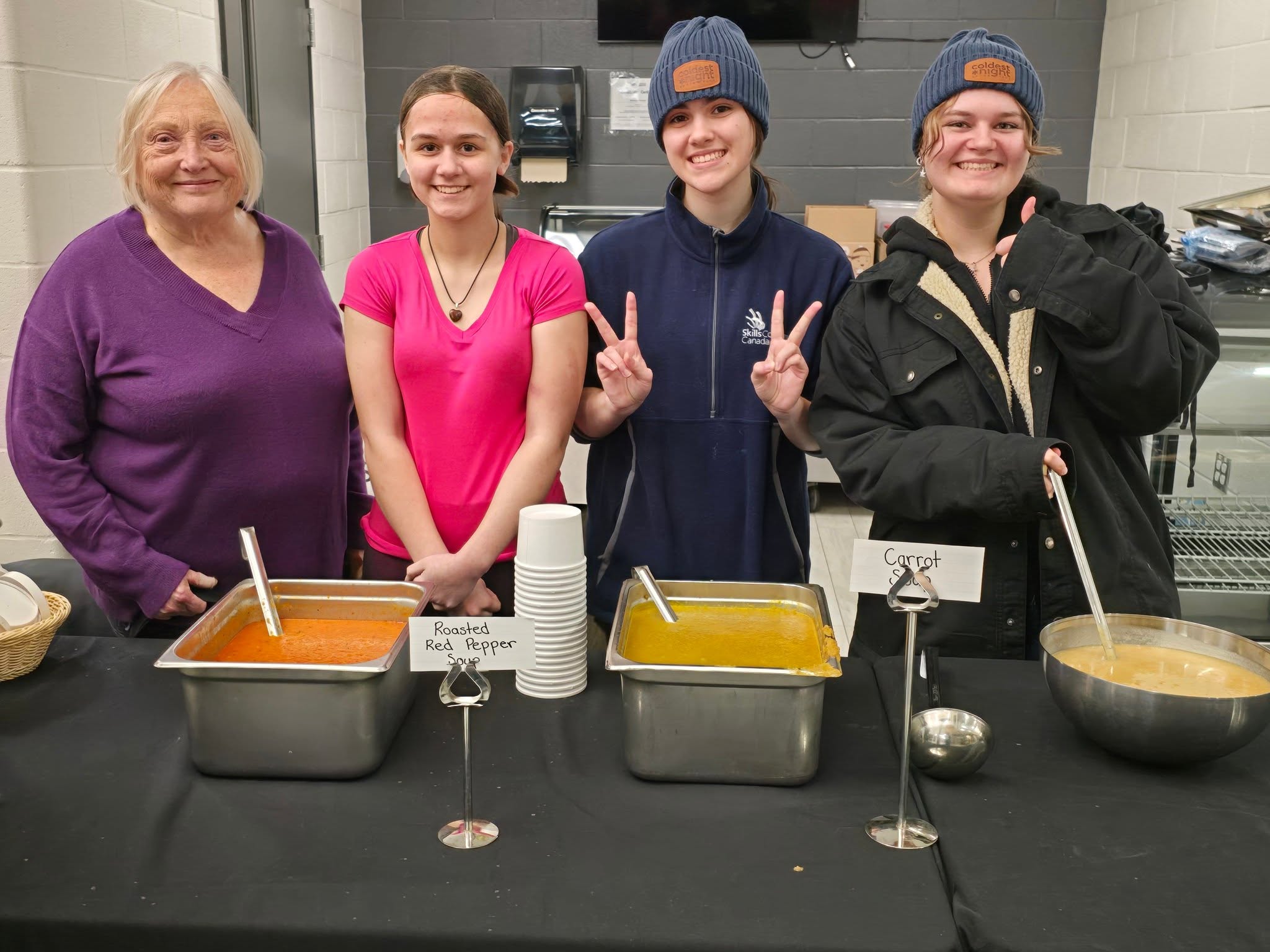 Volunteers serving soup at Coldest Night of the Year